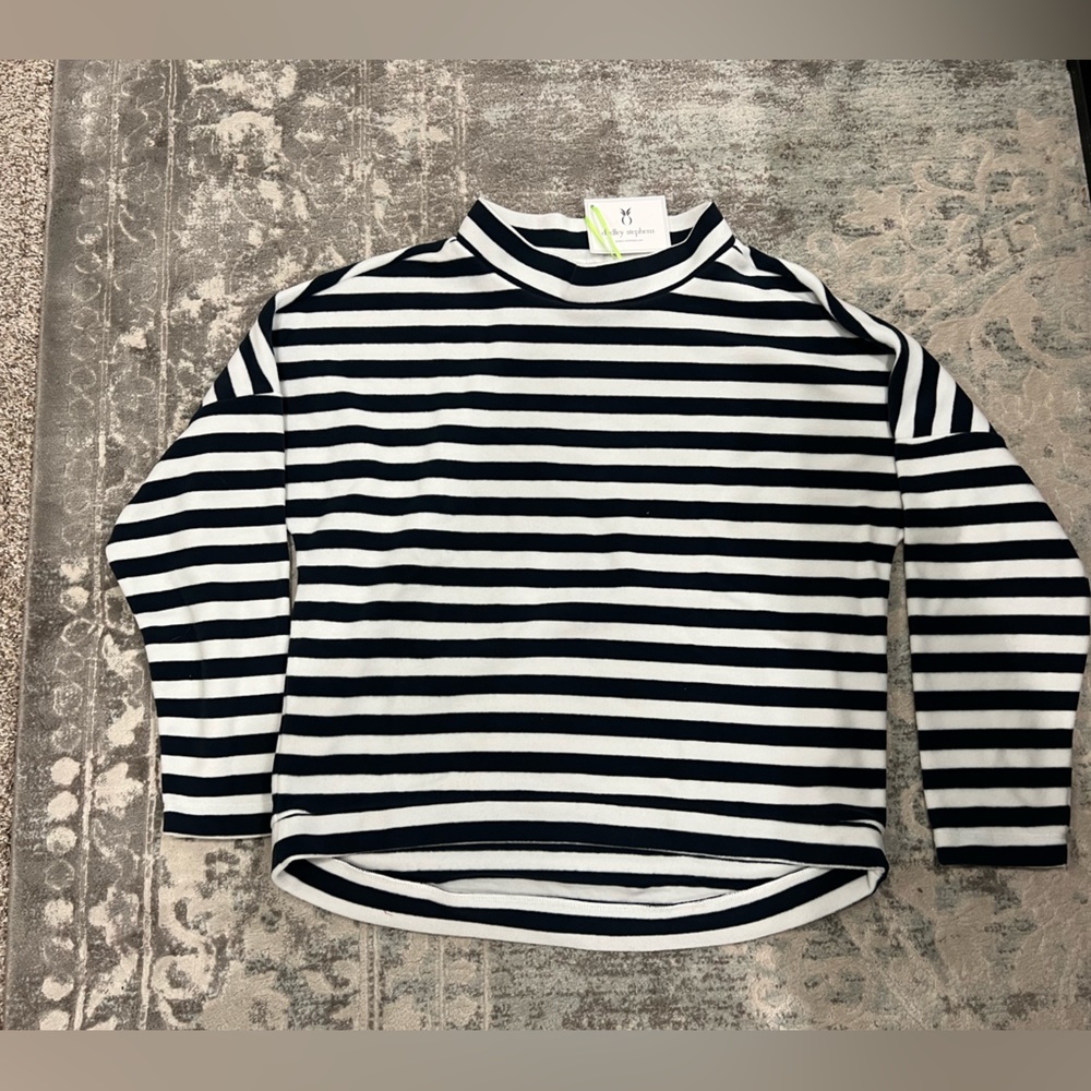 Black and white striped sweater. Size medium, new with tags!